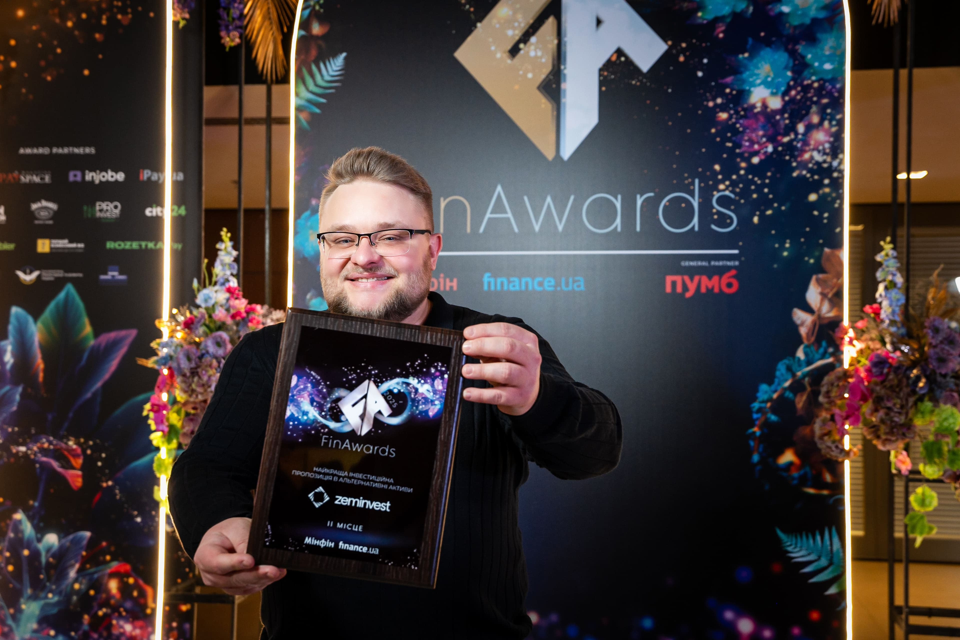 eugene holding fin award